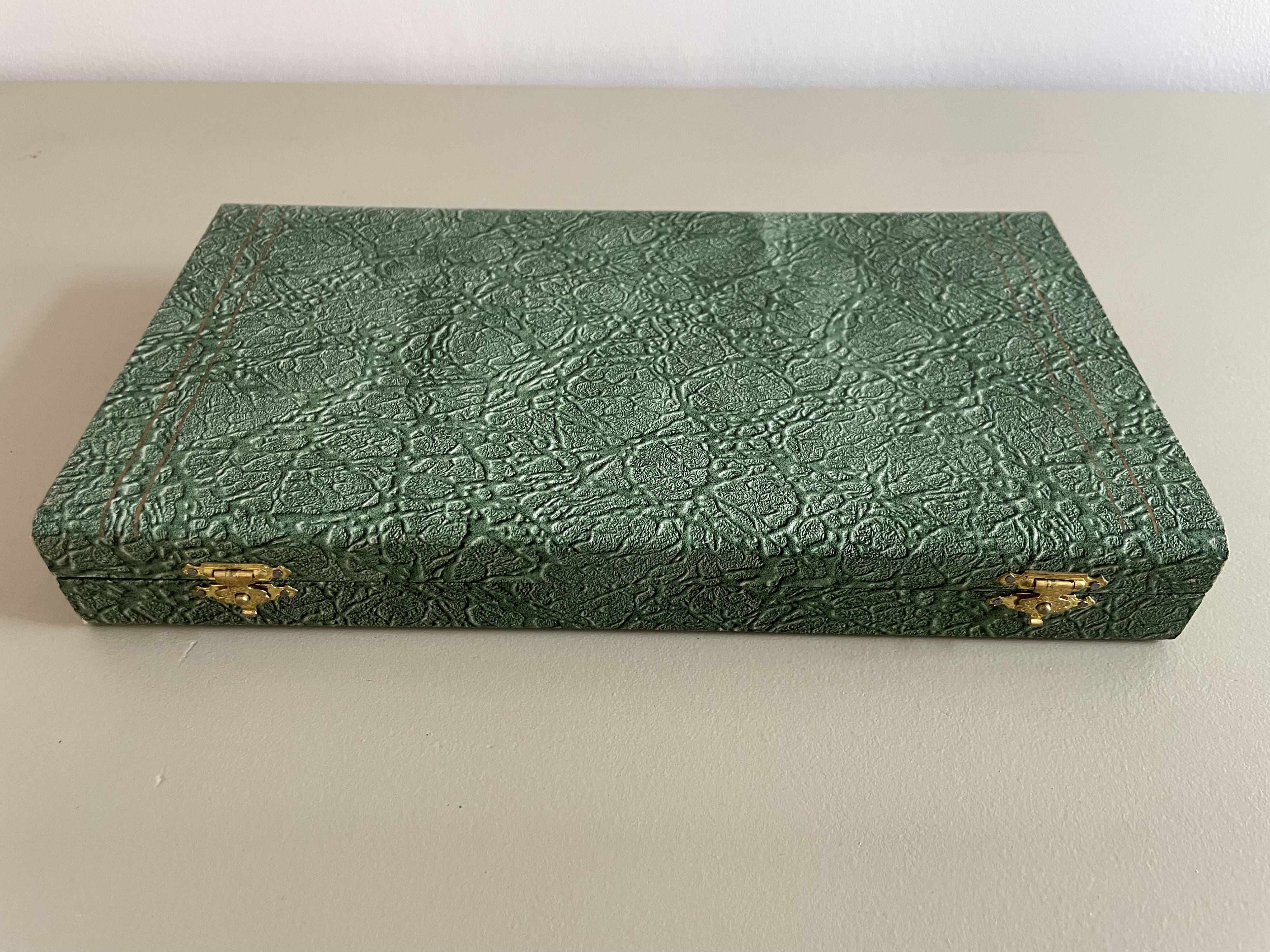 Set of 12 antique knives in green case