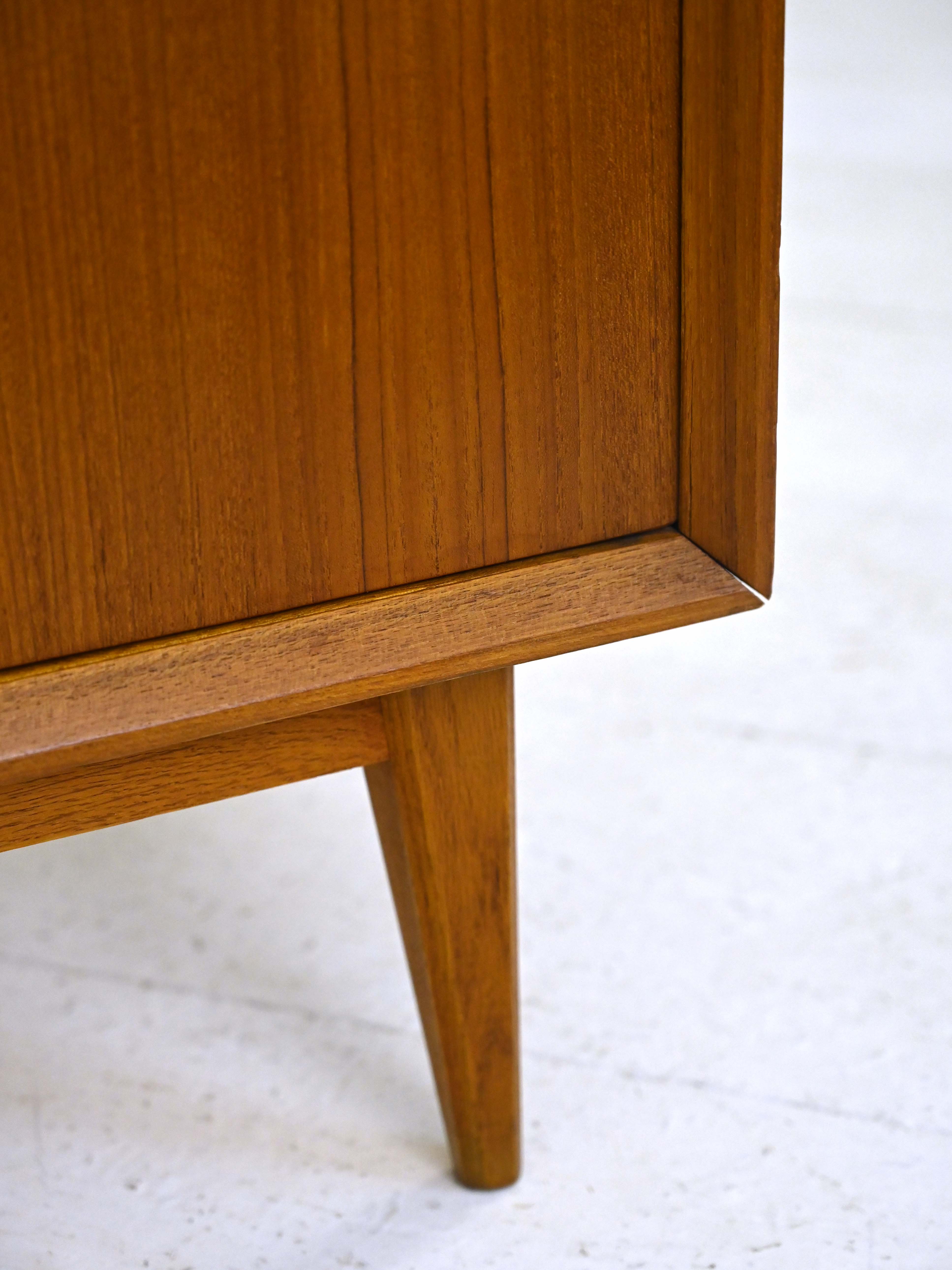 1960s teak cabinet with hinged doors