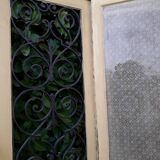 Porte d'entrée cintrée double en chêne, grilles et verre, XIXème