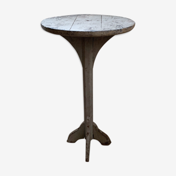 wooden pedestal or primitive winemaker's table