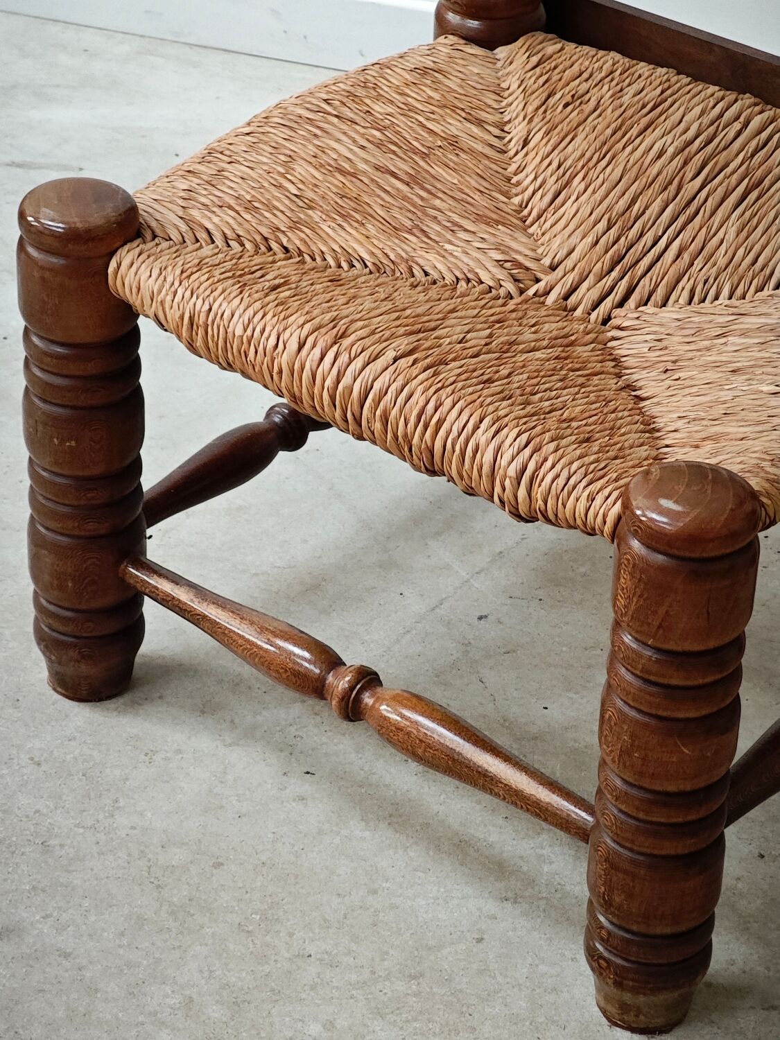 Small Charles Dudouyt chair in wood and straw