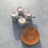 4 ceramic cups and saucers