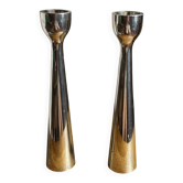 Pair of polished aluminium candlesticks