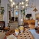 Timeless modern Scandinavian / mid-century chandelier in chrome and smoked glass.