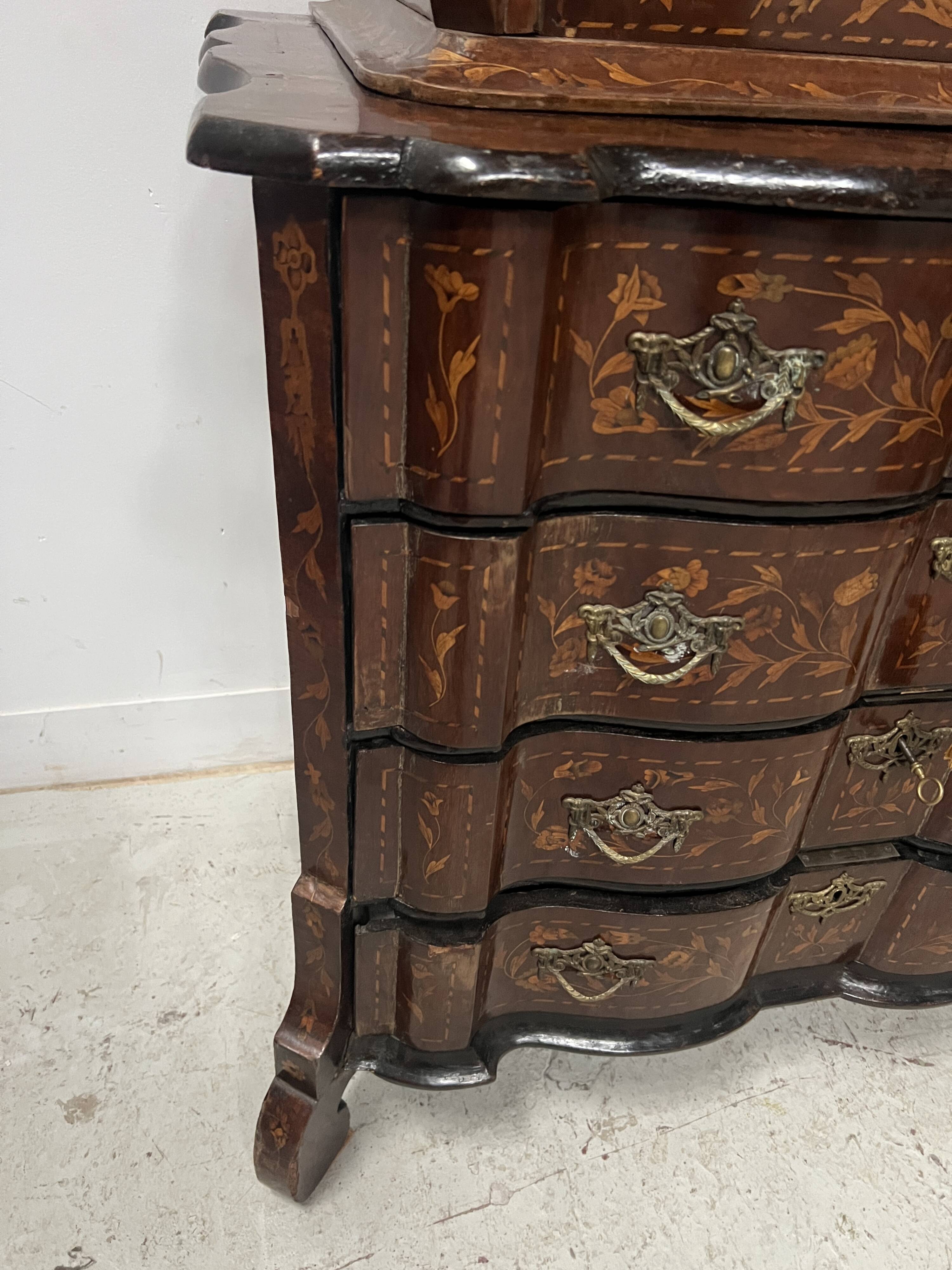 Dutch display cabinet in two parts made of marquetry wood.