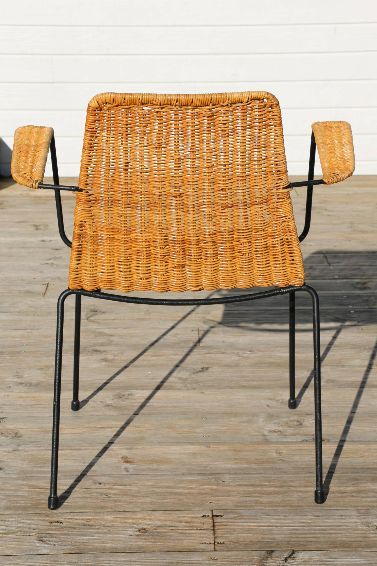 Rattan and steel armchair
