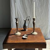 Pair of classic candlesticks in patinated gold metal H25