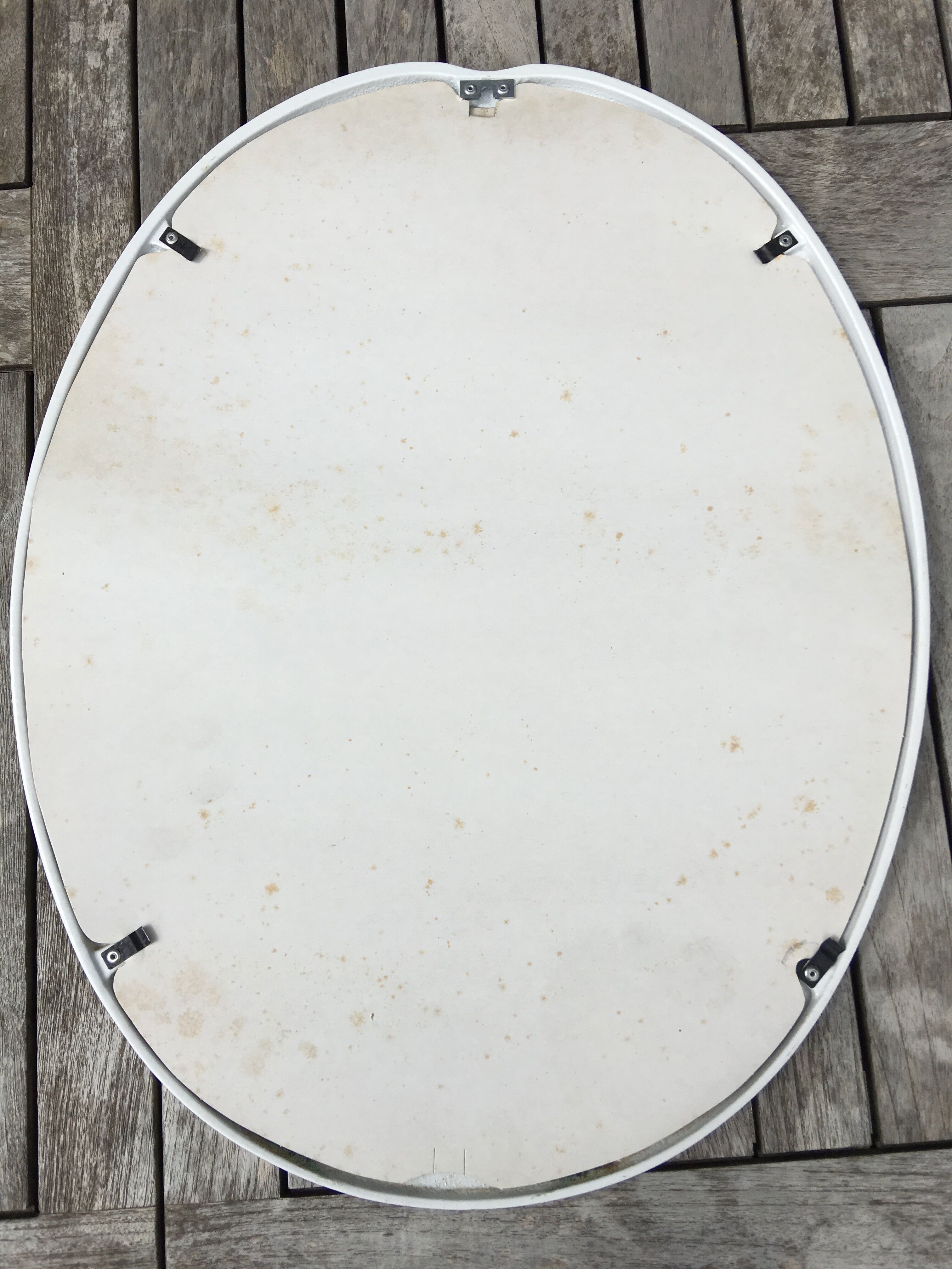 Oval mirror enamelled cast iron and its hook, circa 1950 39x49cm
