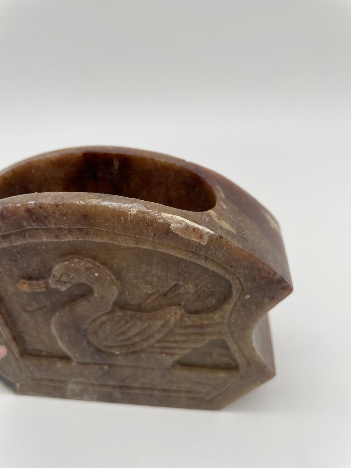 Carved quartz pencil pot and inlaid pearly stones, swans and flowers.