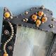 Antique wooden studded mirror