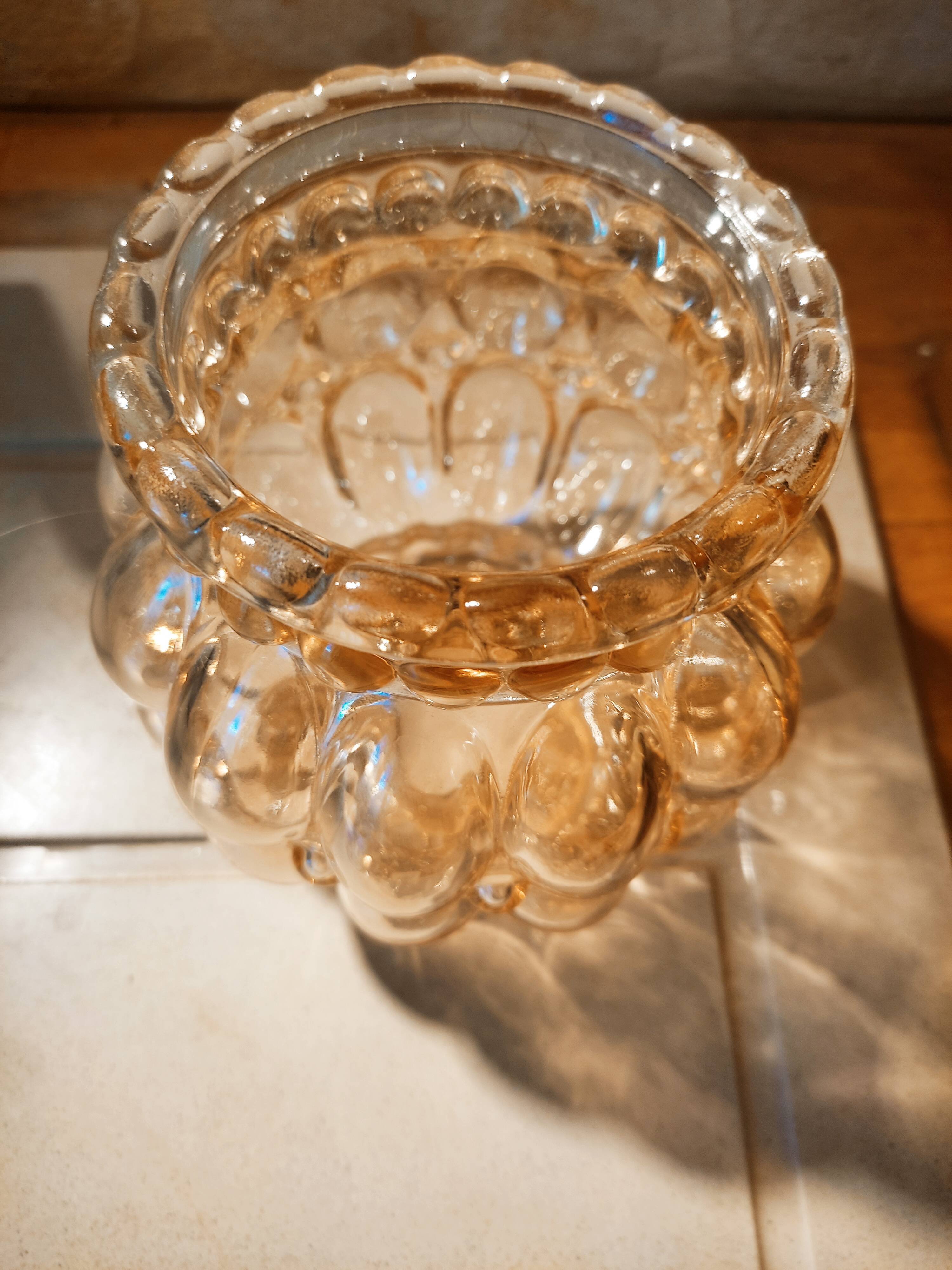 Tulip in iridescent golden glass