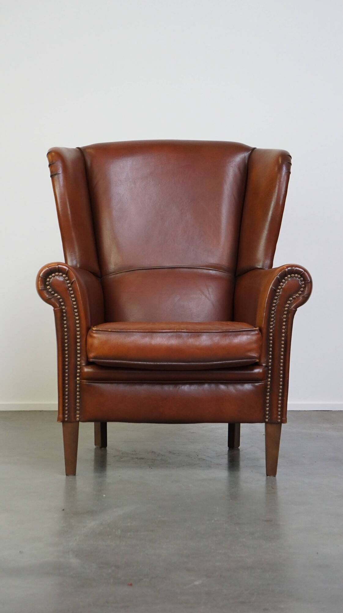 Beautiful classic sheepskin armchair with a beautiful appearance and a comfortable seat