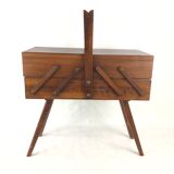 Worker on wooden compass feet