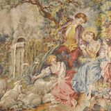 Wall tapestry featuring a pastoral scene.