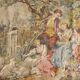 Wall tapestry featuring a pastoral scene.