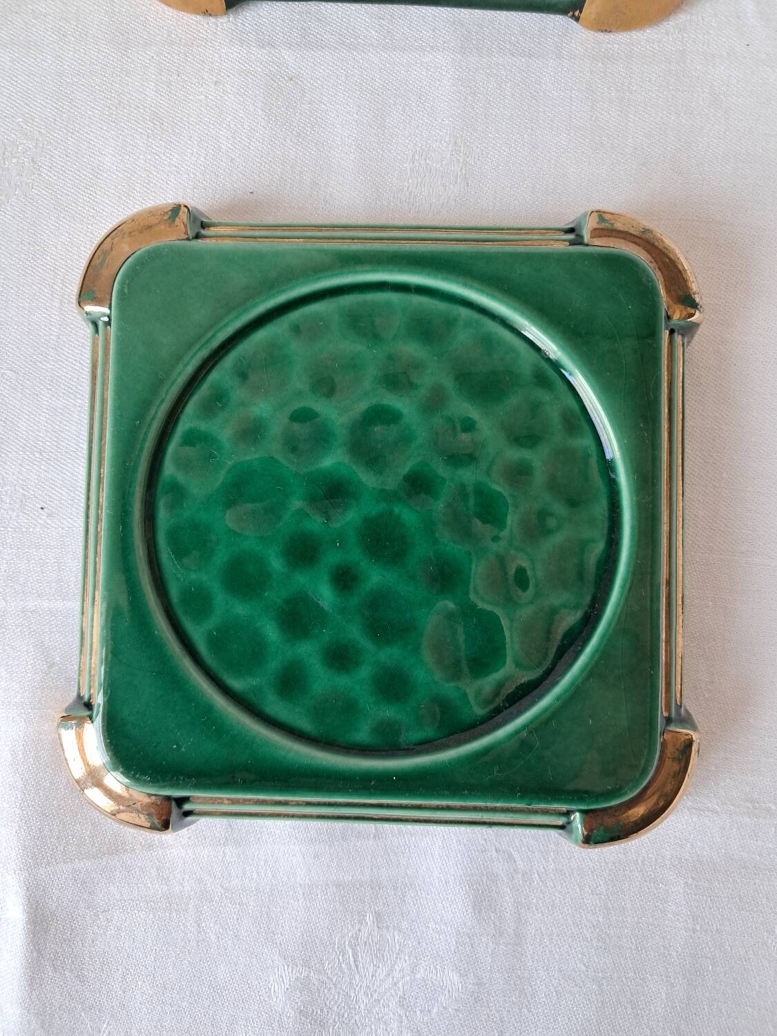 Ceramic trivets and glasses from Poët-Laval. Vintage