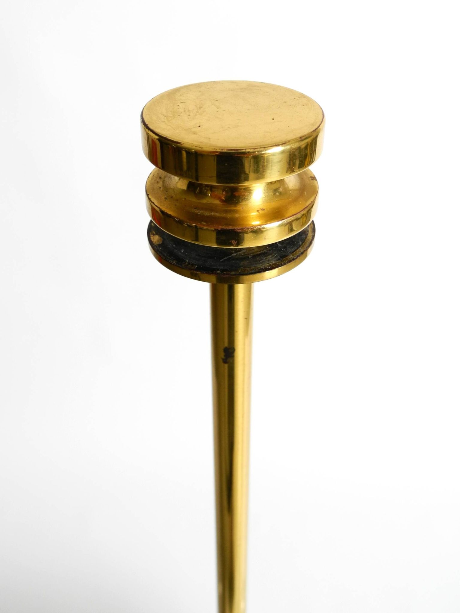 1960s brass table lamp by Vereinigte Werkstätten with an illuminated base