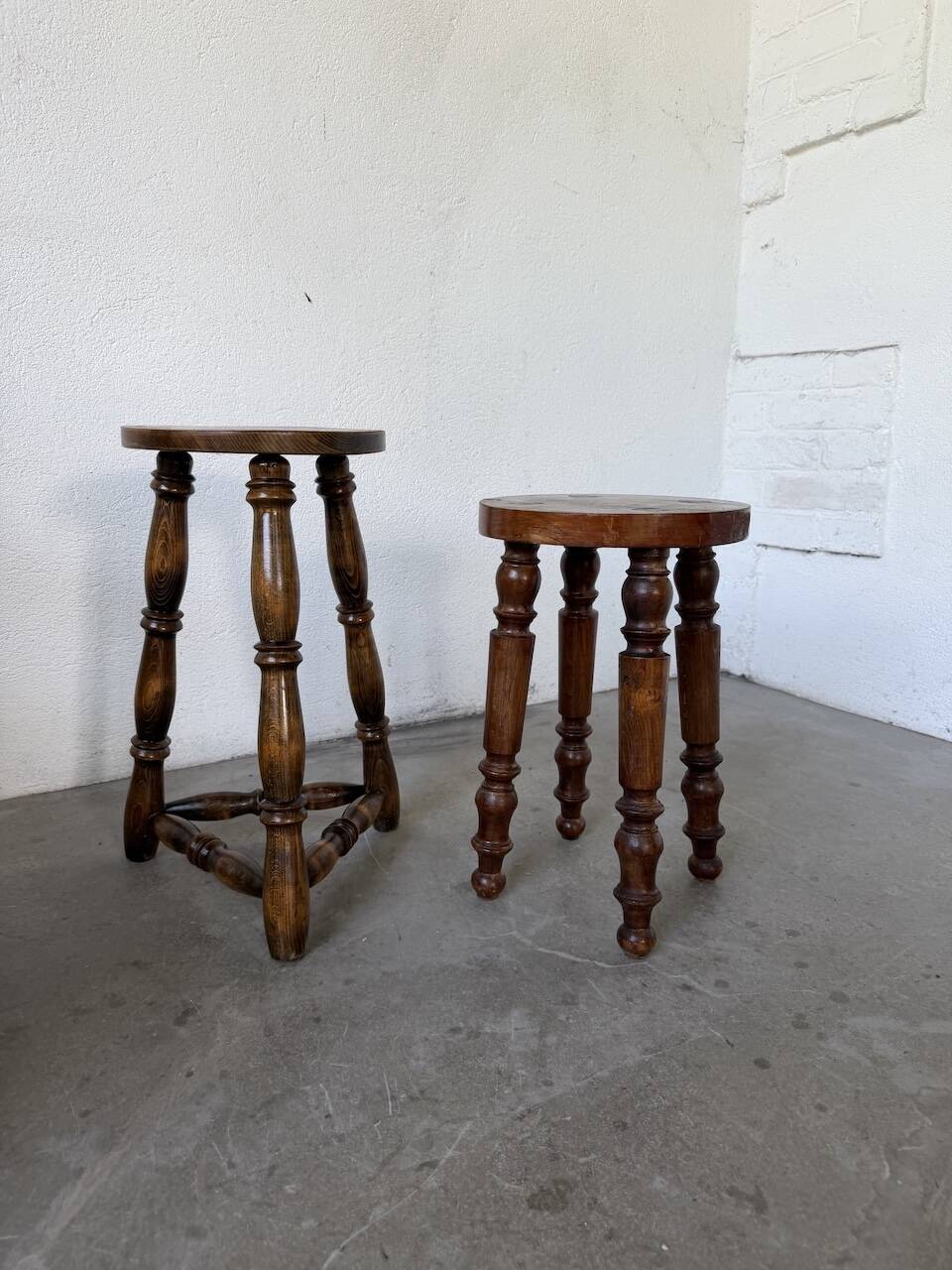 Pair of antique stools with turned legs.