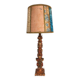 Renaissance table lamp in polychrome carved wood with cherubs.