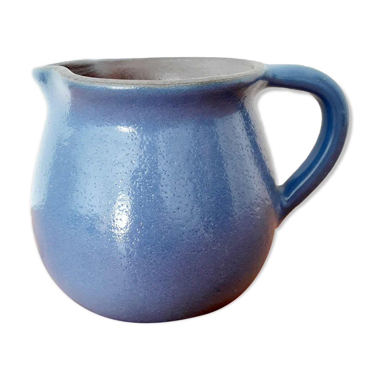 Old glazed blue sandstone pitcher