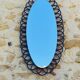 Miroir ovale en bambou et rotin, circa 1960
