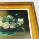 Pair of small framed vintage floral oils