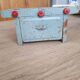 Miniature metal gas stove, (toy from the 1950s)