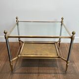 Pair of neoclassical side tables in steel and brass by Maison Jansen.