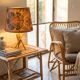 Rattan and bamboo lamp with printed fabric shade.