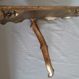 Wall shelf in gilded wood