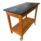 Vintage wooden high table on wheels