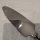 Christofle silver-plated metal cutting pie server with ribbons LXVI