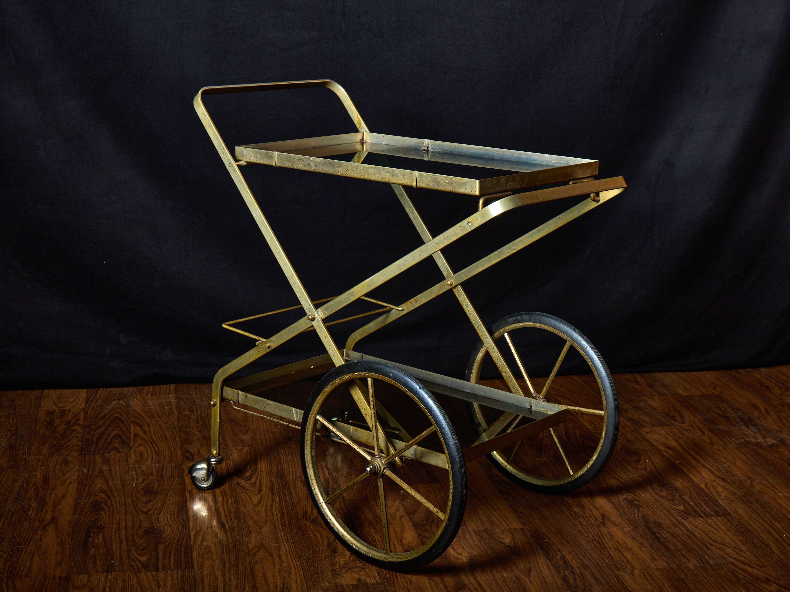 Vintage rolling trolley in gold metal & smoked glass – Retro elegance as