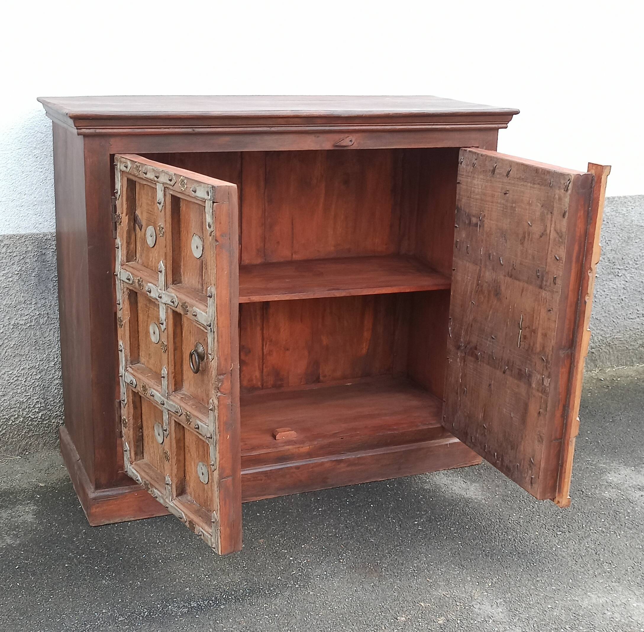 Small old wooden sideboard with two doors