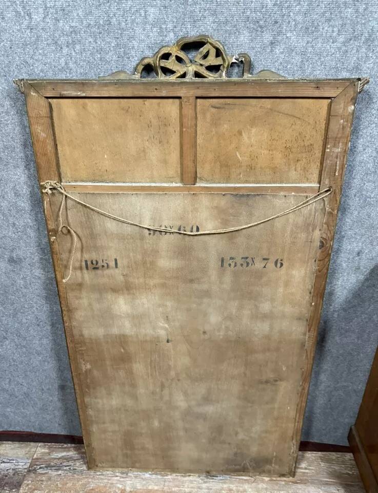 Louis XVI style trumeau mirror in gilded wood, circa 1900