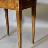 Louis XVI writing table with brass beading