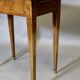 Louis XVI writing table with brass beading