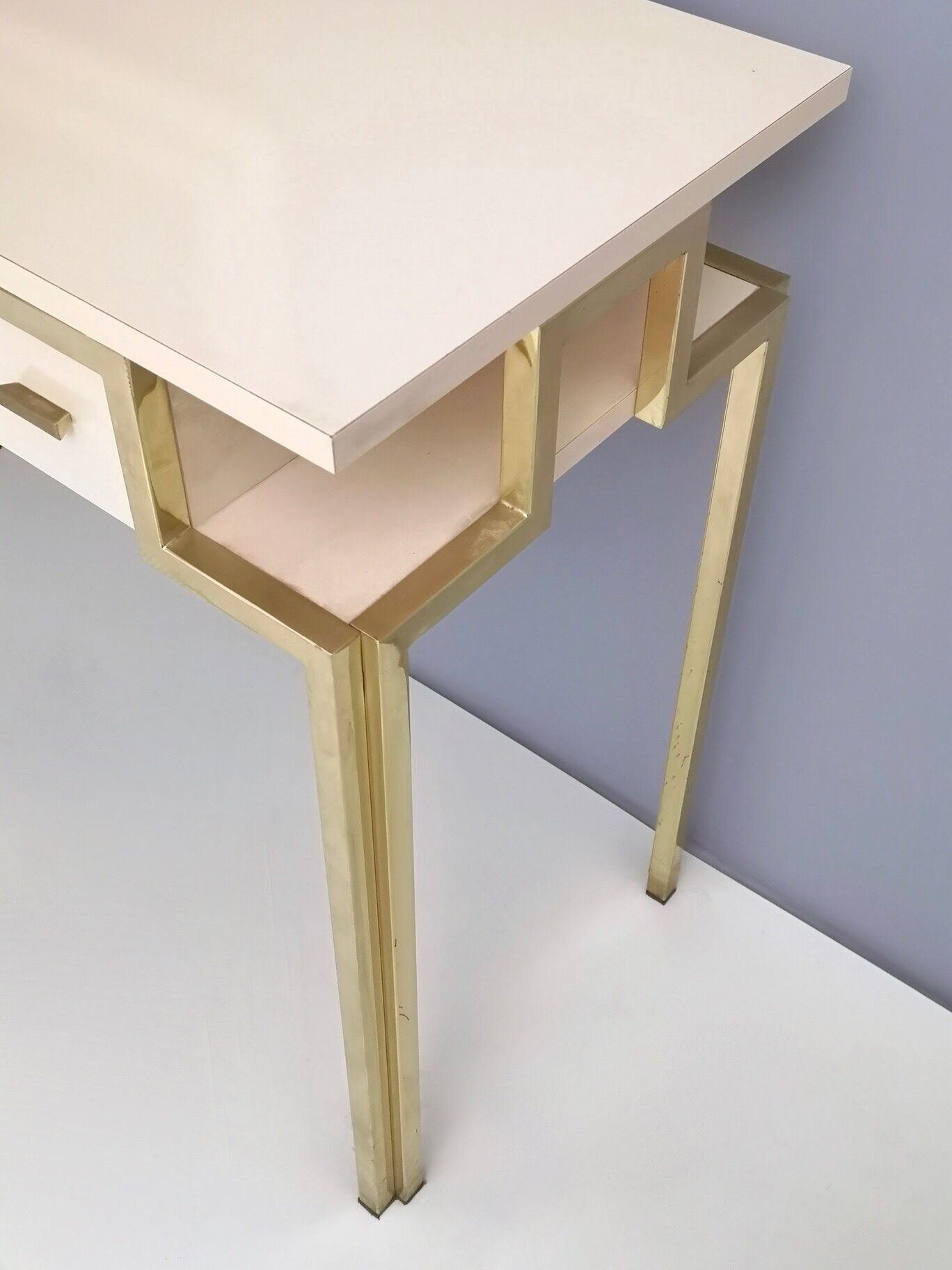 Postmodern pale pink formica and brass console with wall mirror, italy