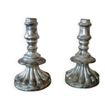Rare pair of antique silvered terracotta candlesticks from the 17th century.