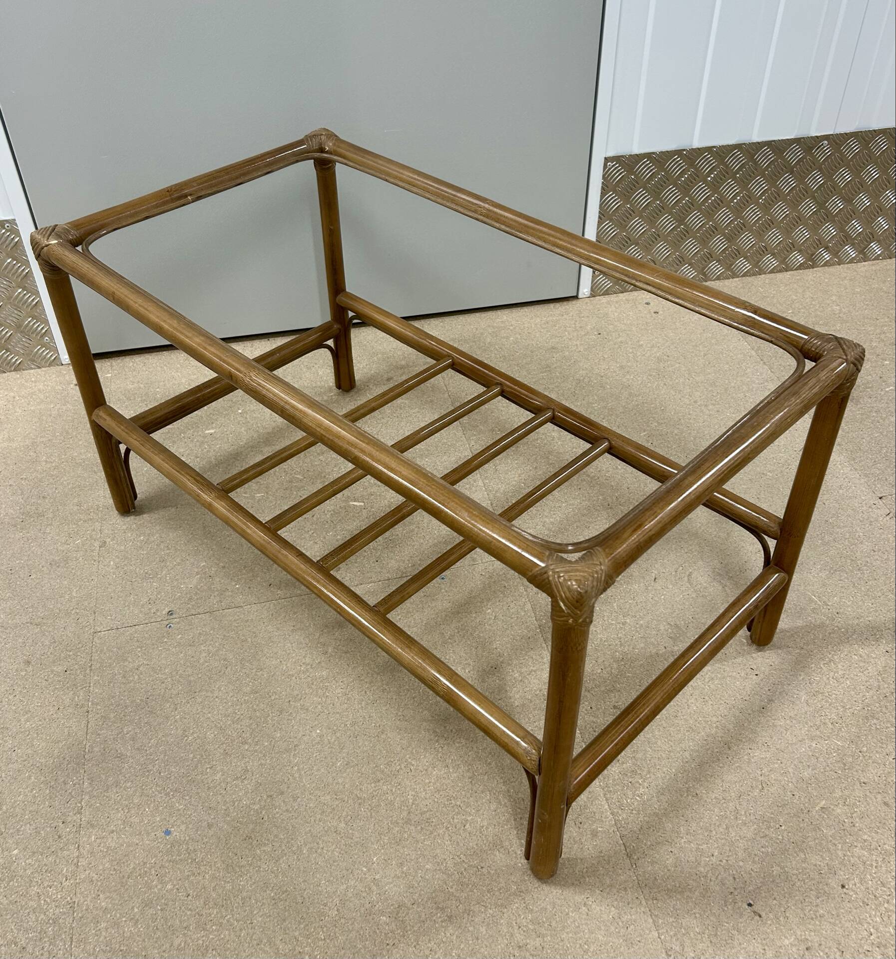 Vintage rattan coffee table (without glass) from the 1970s.