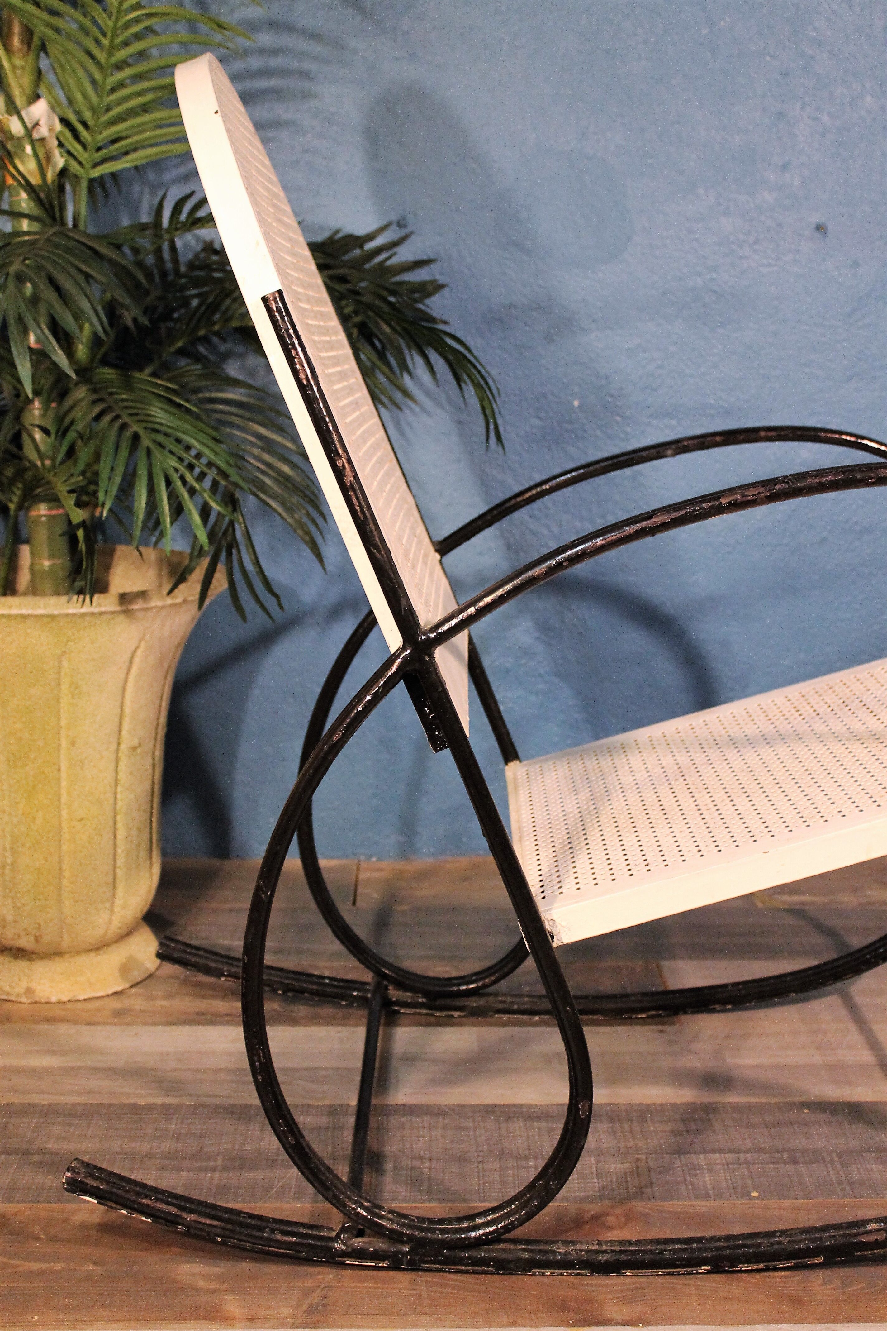 1950s perforated metal rocking chair