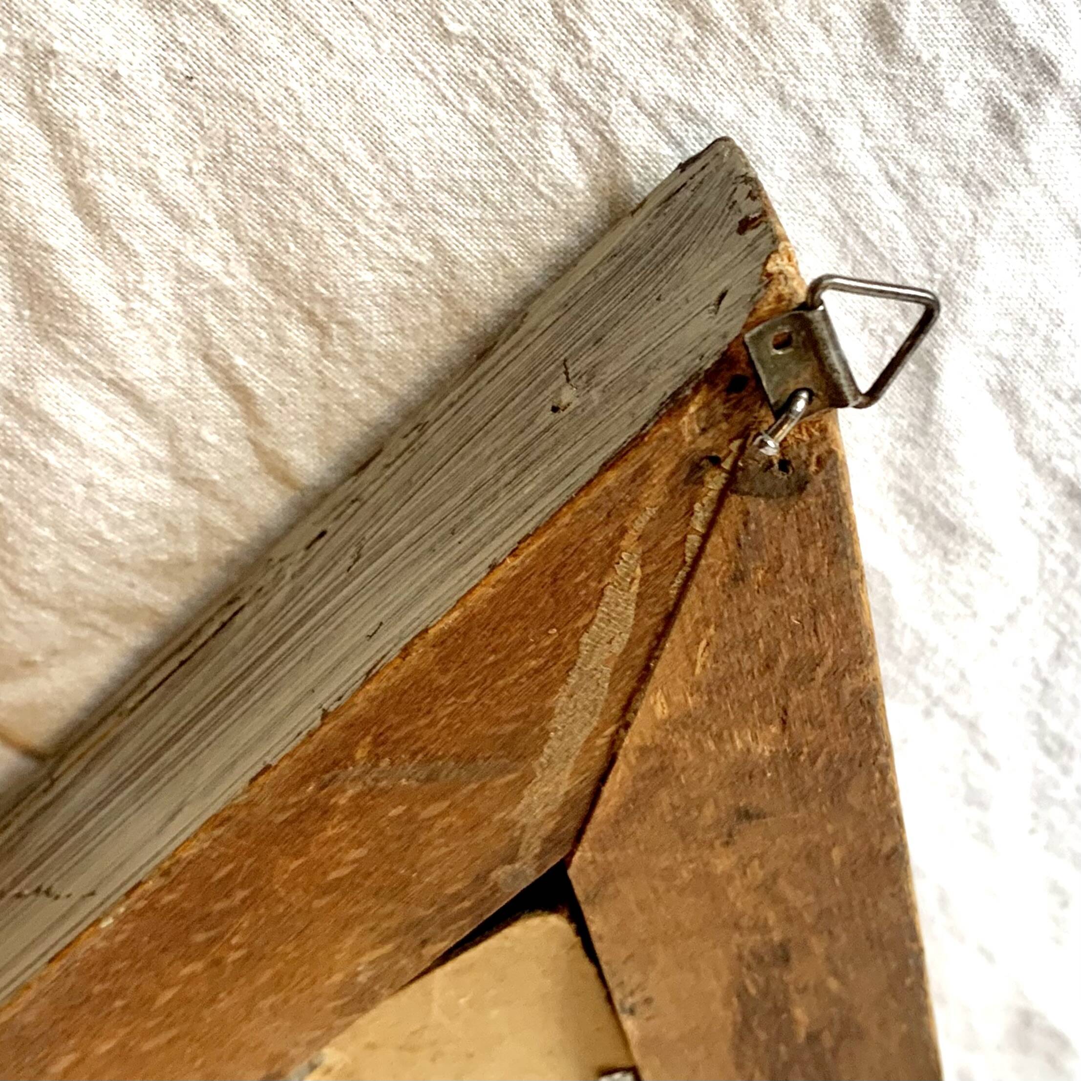 Small vintage wooden diamond wall mirror