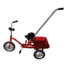 Vintage red metal tricycle