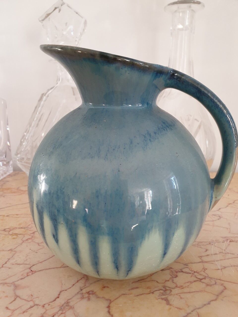 Glazed ceramic pitcher