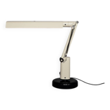 Beige plastic table lamp Lucifer, mid-century modern Scandinavian style.