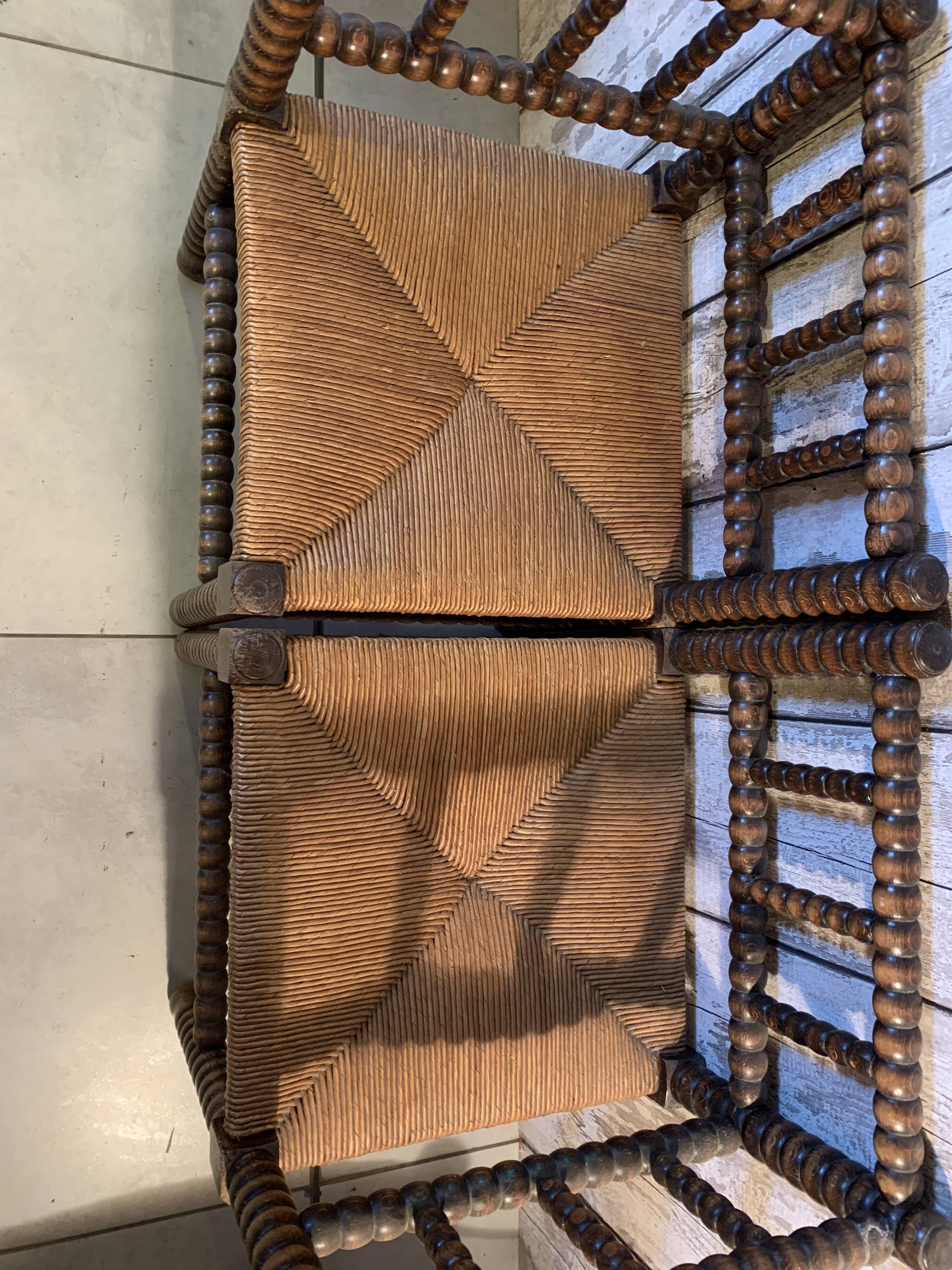 Pair of wooden chairs turned