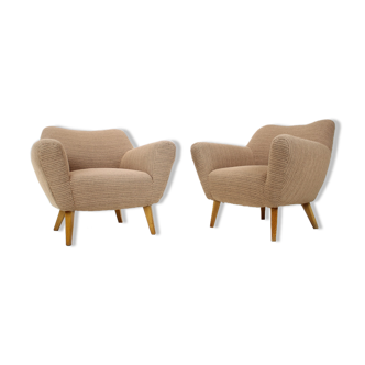 Paire de fauteuils club design années 1970