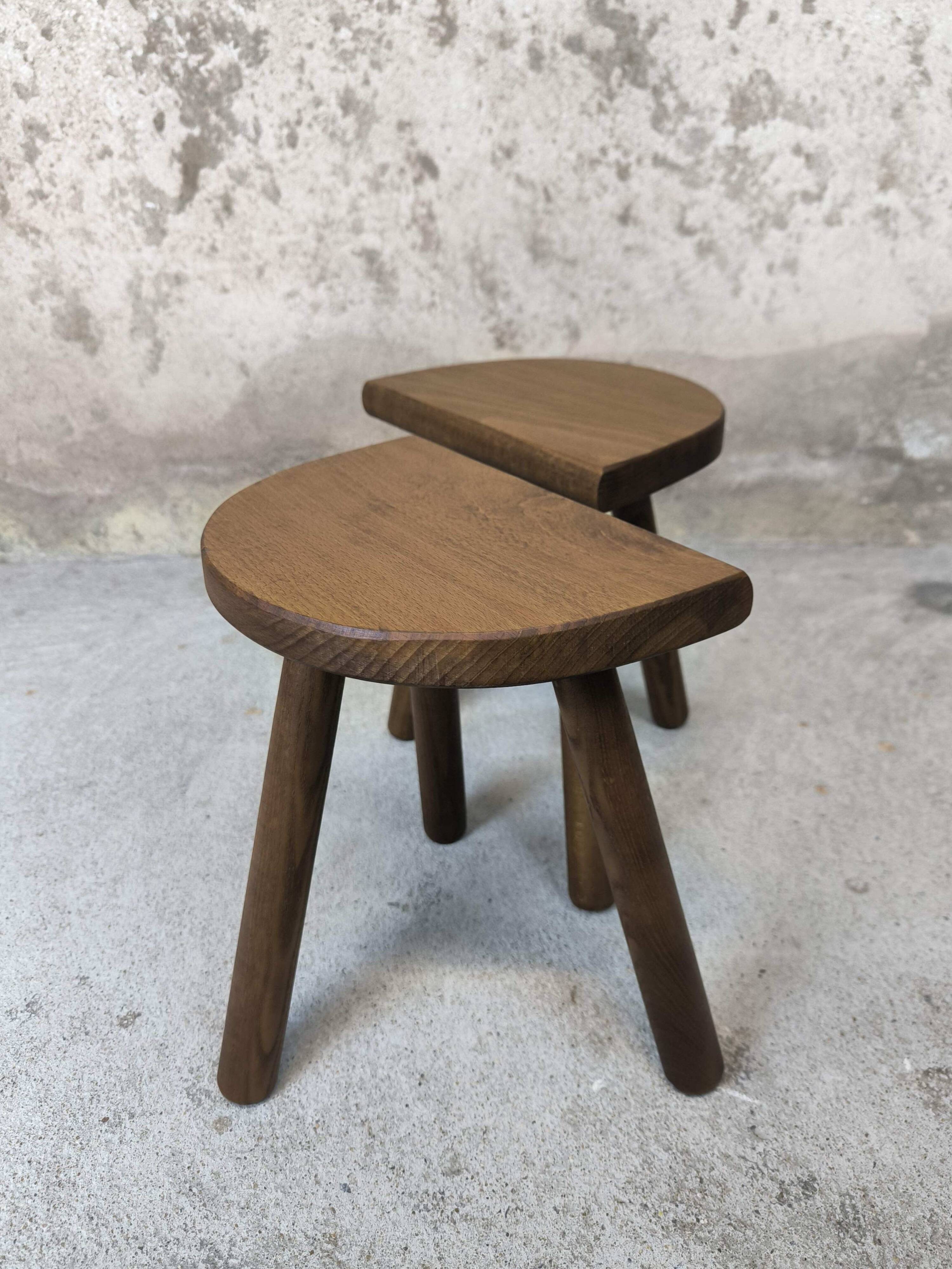Vintage wooden tripod stool pair.