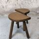 Vintage wooden tripod stool pair.