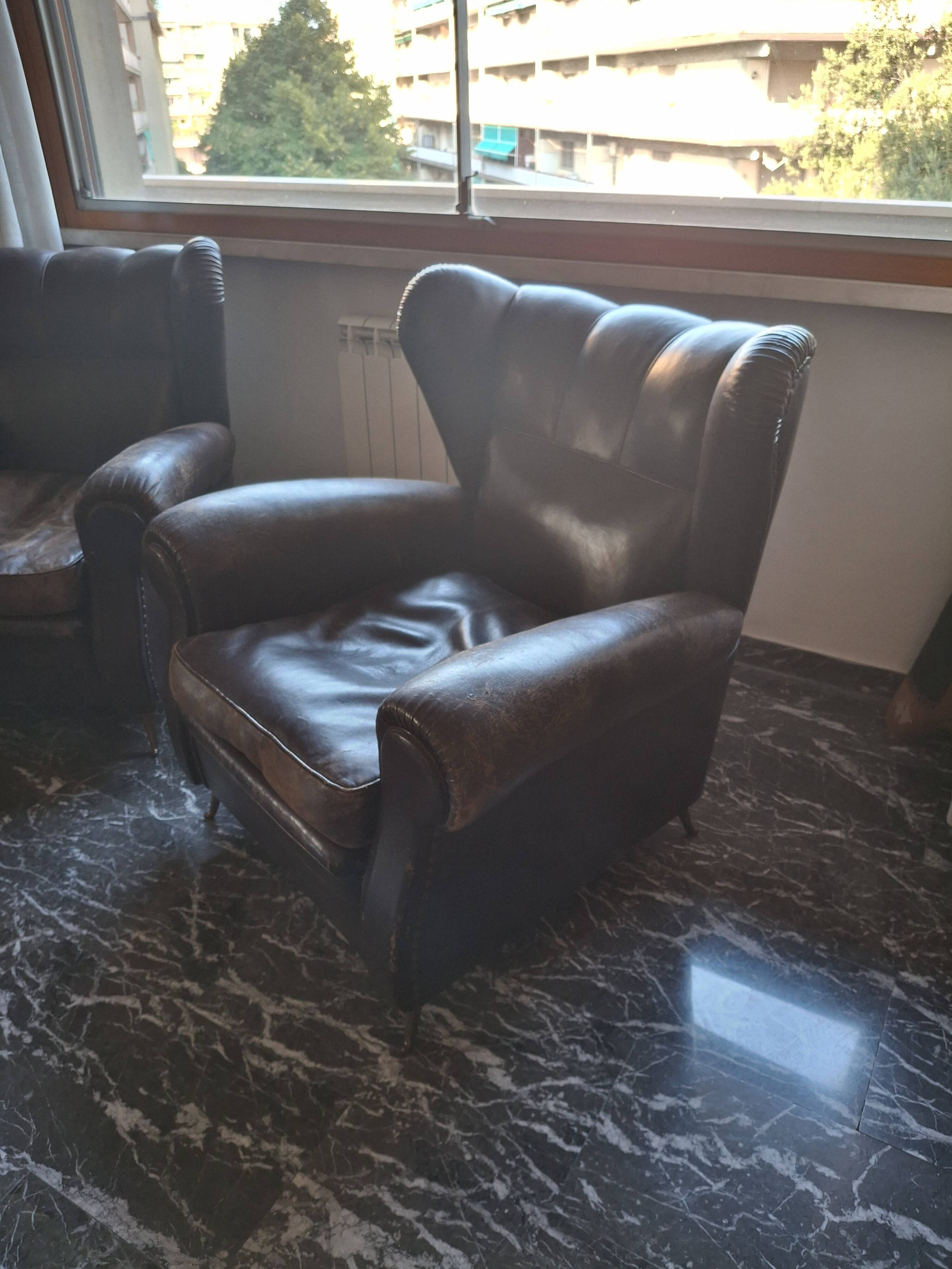 Italian leather bergère armchairs
